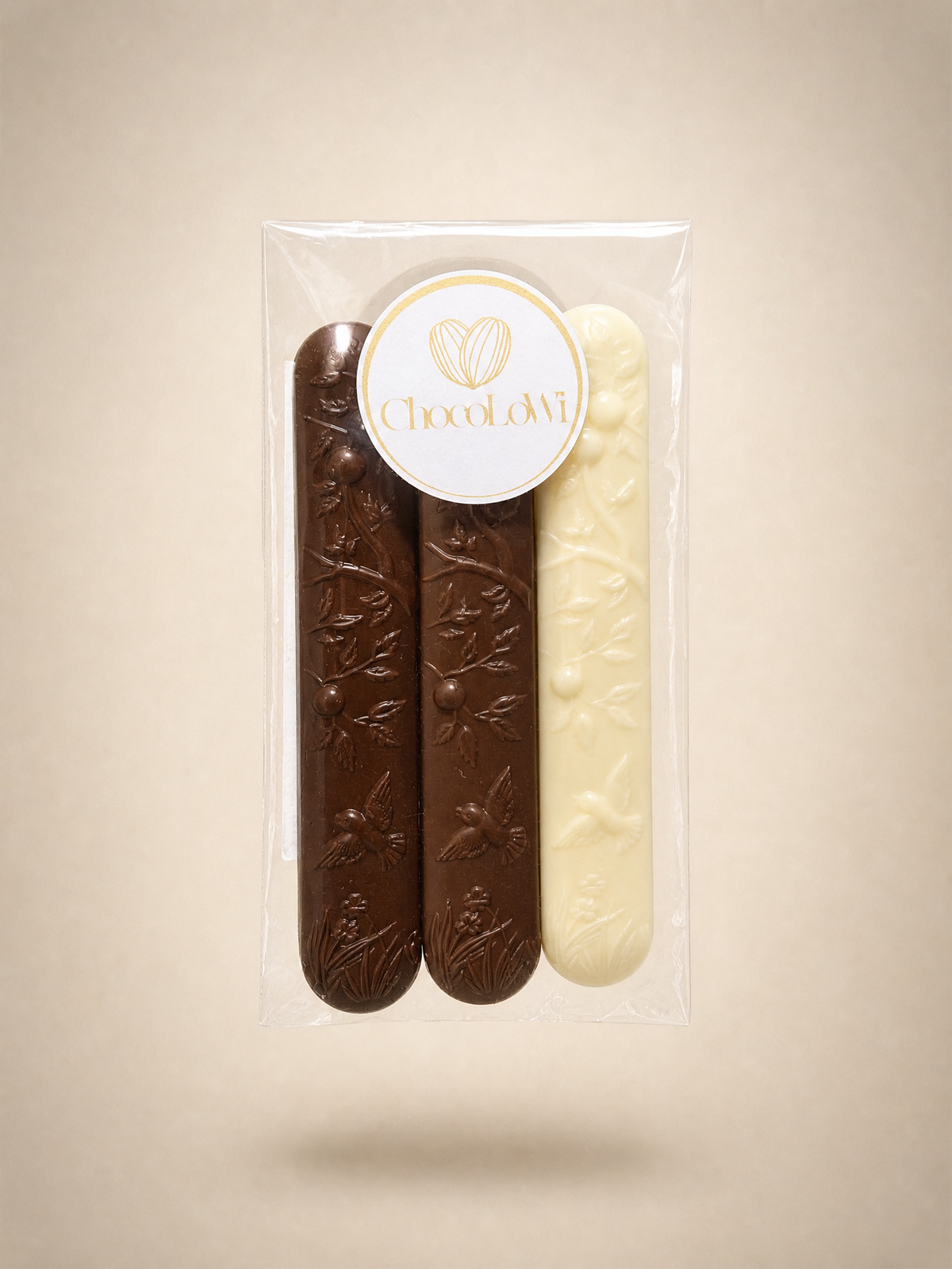 Pose med tre forskellige chokoladestænger – mørk, mælk og hvid Valrhona
